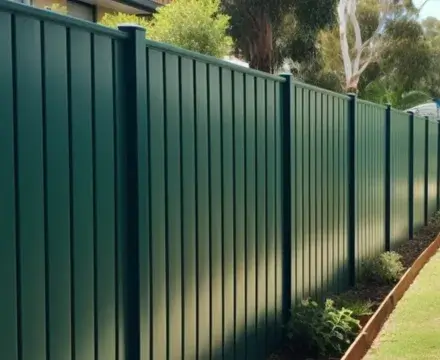 A green Colorbond fence installation in Campbelltown